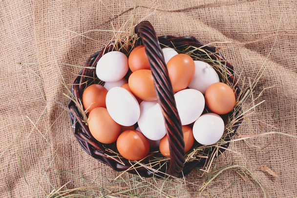basket full of easter eggs - Foto, afbeelding