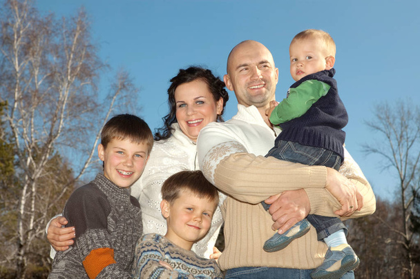 Happy family, father, mother and four sons photo in nature - Фото, изображение