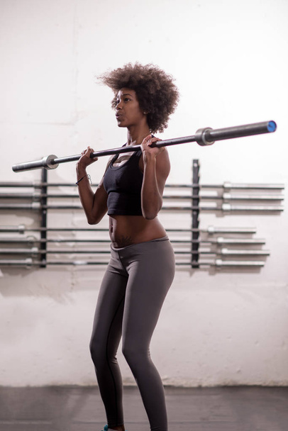 lifting  african american sport woman - 写真・画像