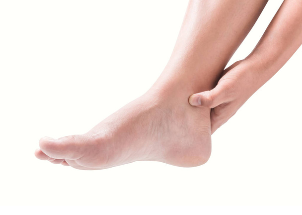 Ból pięty stóp kobieta na białym tle, opieki zdrowotnej i medycznej koncepcja - Zdjęcie, obraz