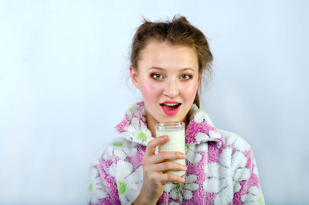 beautiful girl in pajamas with milk - Fotó, kép