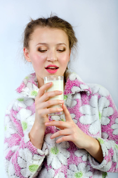 beautiful girl in pajamas with milk - 写真・画像