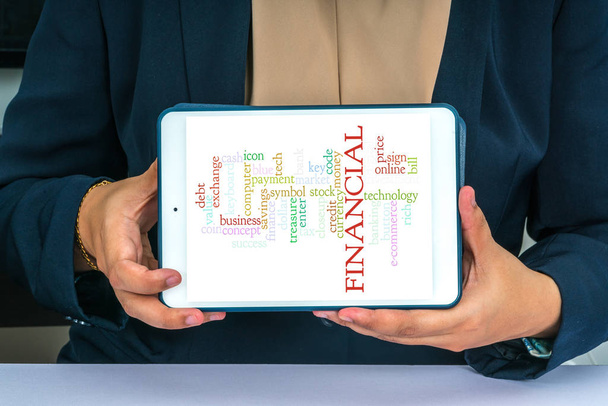 Businesswoman holding tab with conceptual text - Photo, Image