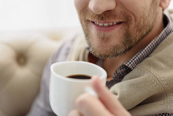 Happy man drinking hot espresso - Фото, зображення