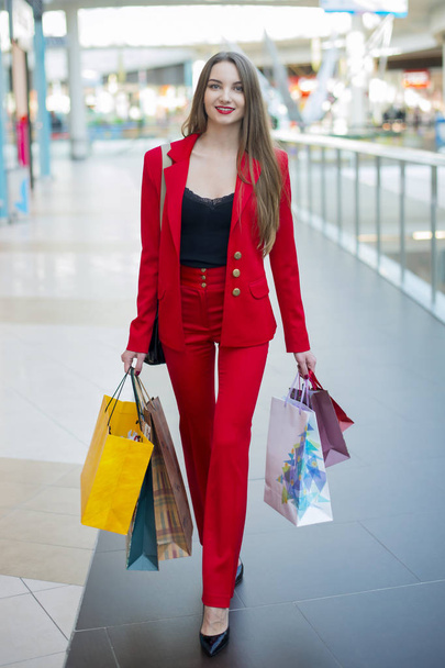 The girl in the red jacket. - 写真・画像