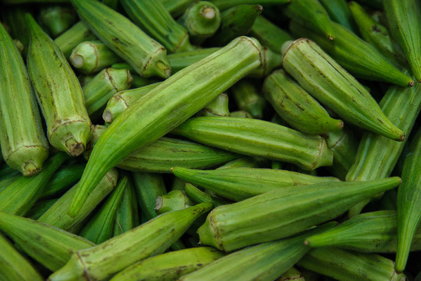 Food background - fresh okra plant - Photo, Image