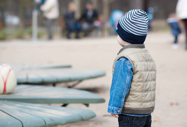 Young child in the playground - Fotoğraf, Görsel