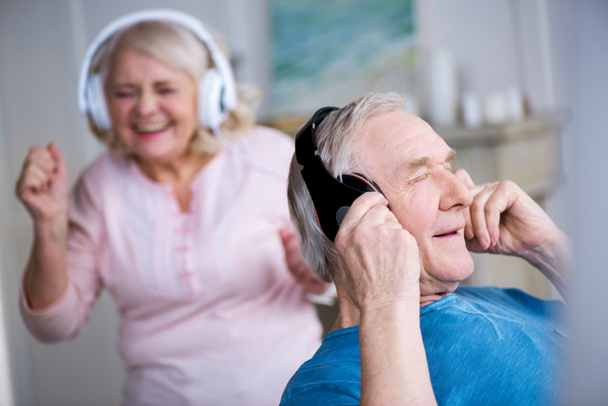 Senior couple in headphones - Photo, Image