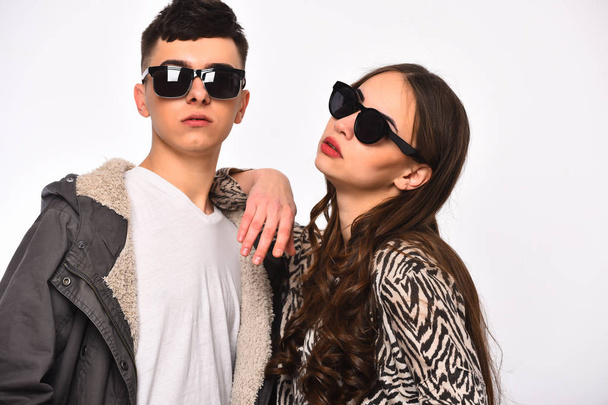 couple of pretty girl and young guy in fashionable sunglasses - Foto, Imagem