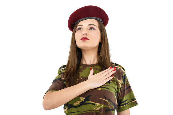 beautiful young woman soldier in military camouflage outfit - Photo, Image