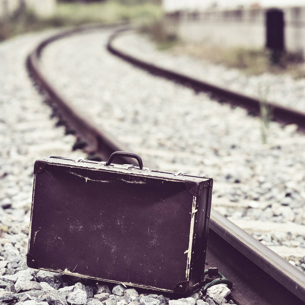 suitcase next to the railroad tracks - Photo, Image