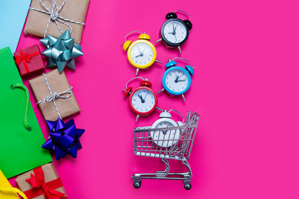 alarm clocks in small shopping cart - Photo, Image