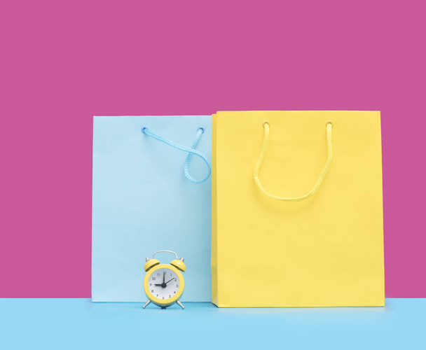 shopping bags and alarm clock - Photo, Image