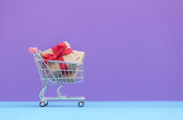 gift boxes in shopping cart  - Photo, Image