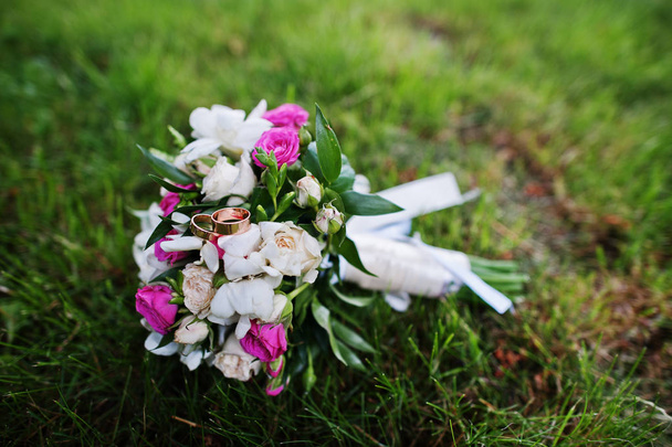 Tenderness wedding bouquet with small white and rose roses on gr - Fotó, kép