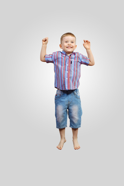 Happy kid jumping - Φωτογραφία, εικόνα
