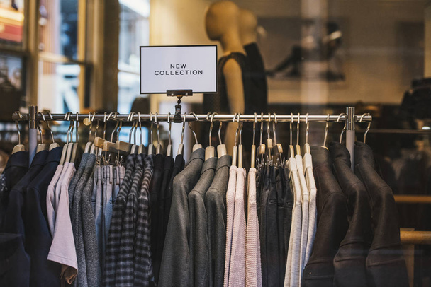 Fashion store - clothing on hangers. - Photo, Image
