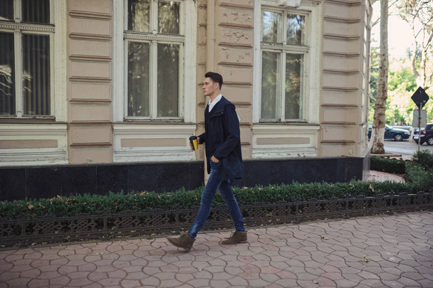Hipster man walking in the streets - Фото, зображення