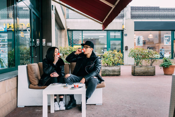 couple having coffee sitting in bar  - Фото, зображення