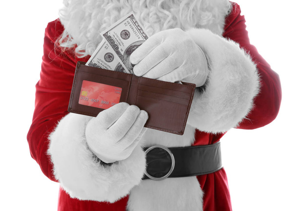 Santa Claus hands holding wallet  - Φωτογραφία, εικόνα
