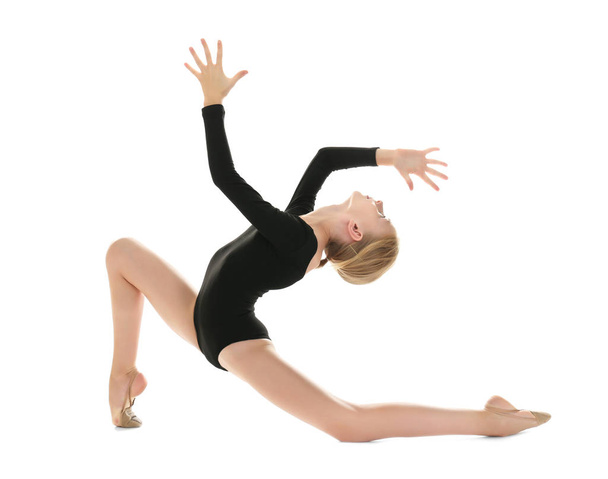 Young girl doing gymnastic exercise - Фото, изображение
