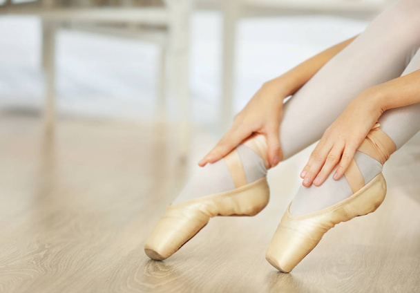 Legs of ballerina in ballet shoes - 写真・画像