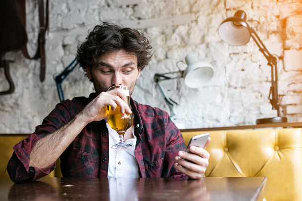 men having beer in a pub - Foto, afbeelding