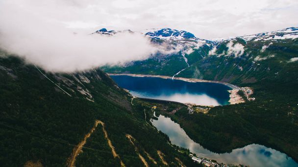 trolls tongue with a lake and mountains, Norway - Valokuva, kuva