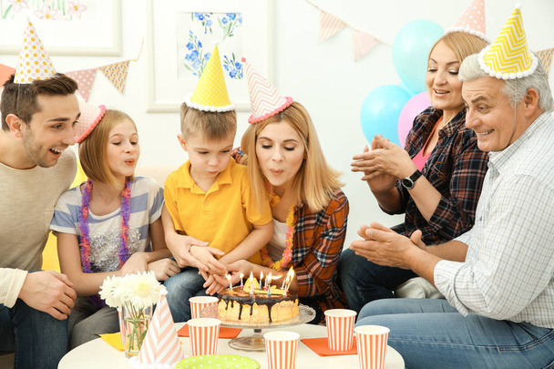 Birthday party. Family sitting at served table - Φωτογραφία, εικόνα