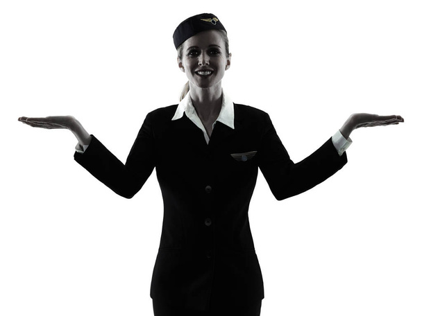 Stewardess cabin crew woman  hands open isolated silhouette - Photo, image