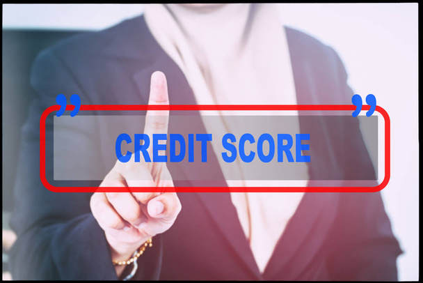 Hand and text  "CREDIT SCORE" with vintage background. Technology concept. - Photo, Image