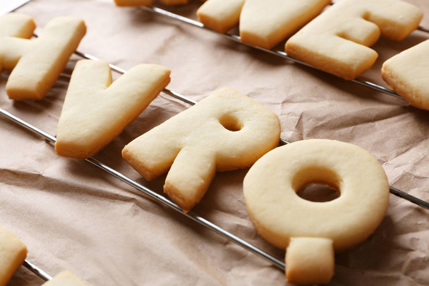 Cookie alphabet on paper - 写真・画像