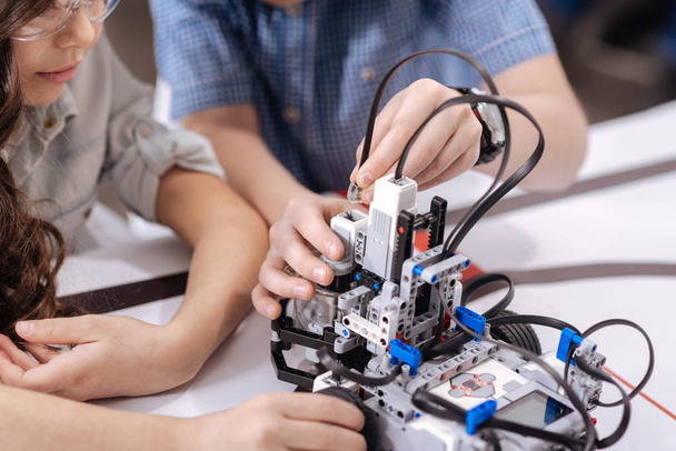 Concentrated pupils testing electronic robot - Fotografie, Obrázek