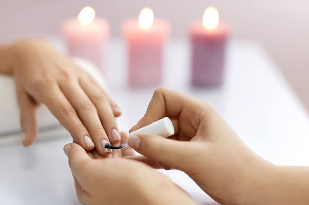 Nail Care. Beautiful Female Hands Applying Polish On Nails - Photo, image
