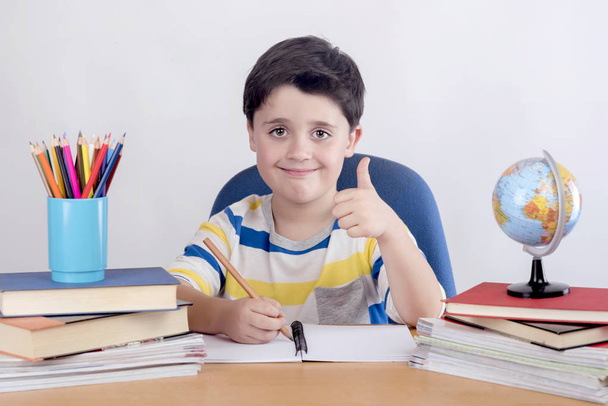Smiling boy studying - Photo, Image