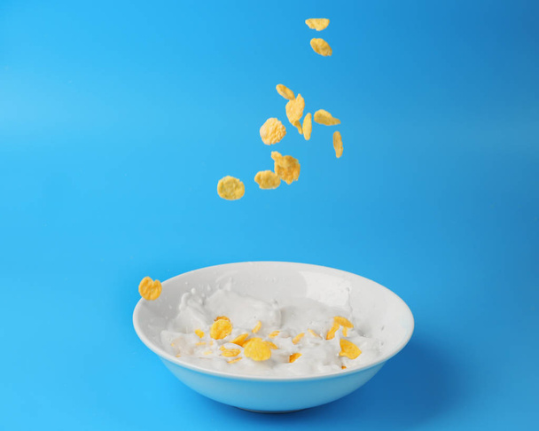 Corn flakes with milk in bowl  - Photo, Image