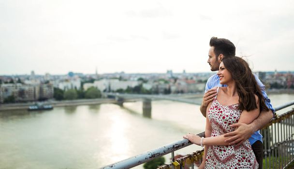 couple in love sightseeing and smiling - Фото, зображення