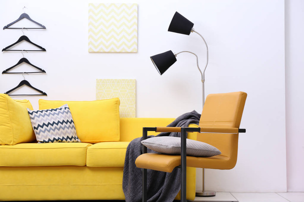 room interior with yellow sofa - Фото, изображение