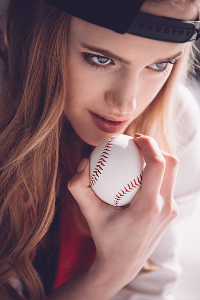Young woman with baseball ball  - Fotoğraf, Görsel