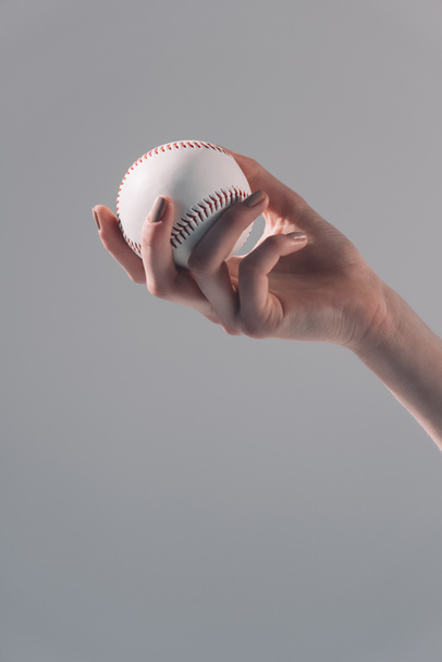 Jeune femme avec balle de baseball
  - Photo, image
