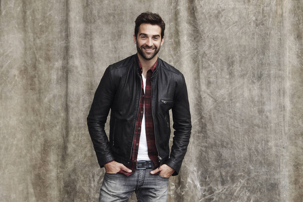 Bearded man in jeans and jacket  - Photo, image