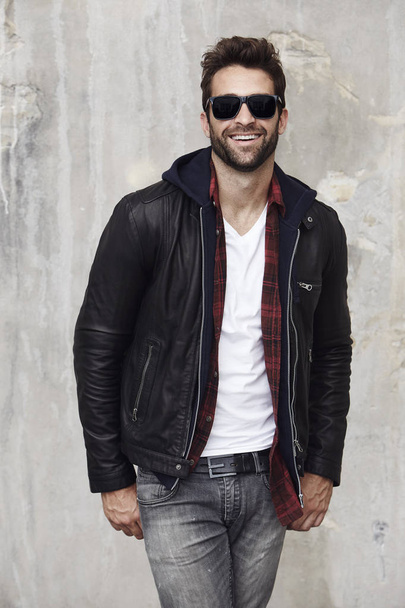 Laughing man in leather jacket  - Фото, зображення