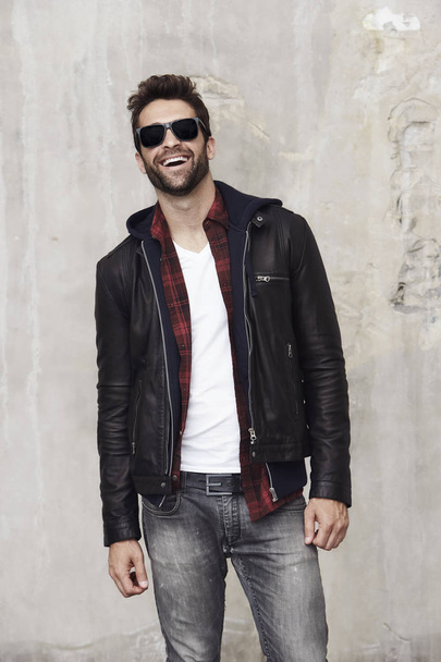 Laughing man in leather jacket  - Fotó, kép