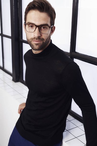 Handsome man in black sweater - Фото, изображение