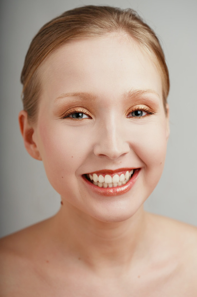 Portrait of happily laughing pretty girl with clear makeup - Photo, image