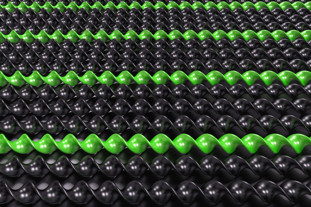 Black and green plastic spiral sticks on black background - Φωτογραφία, εικόνα