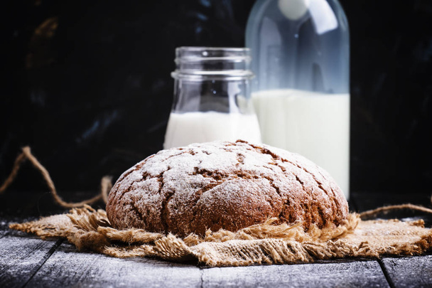 Homemade rye bread and fresh milk  - Photo, Image