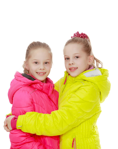 charming twin girls in blazers - 写真・画像