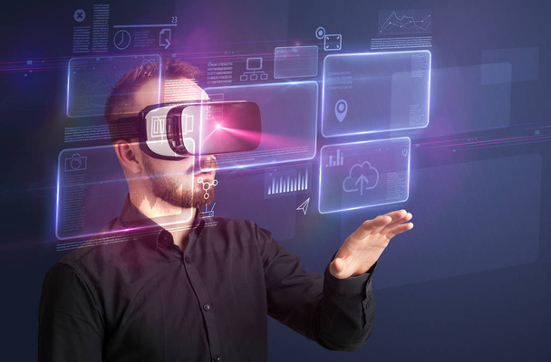 Businessman with virtual reality goggles - Photo, image