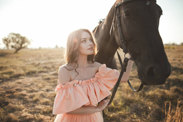 Young girl with horse - Fotó, kép